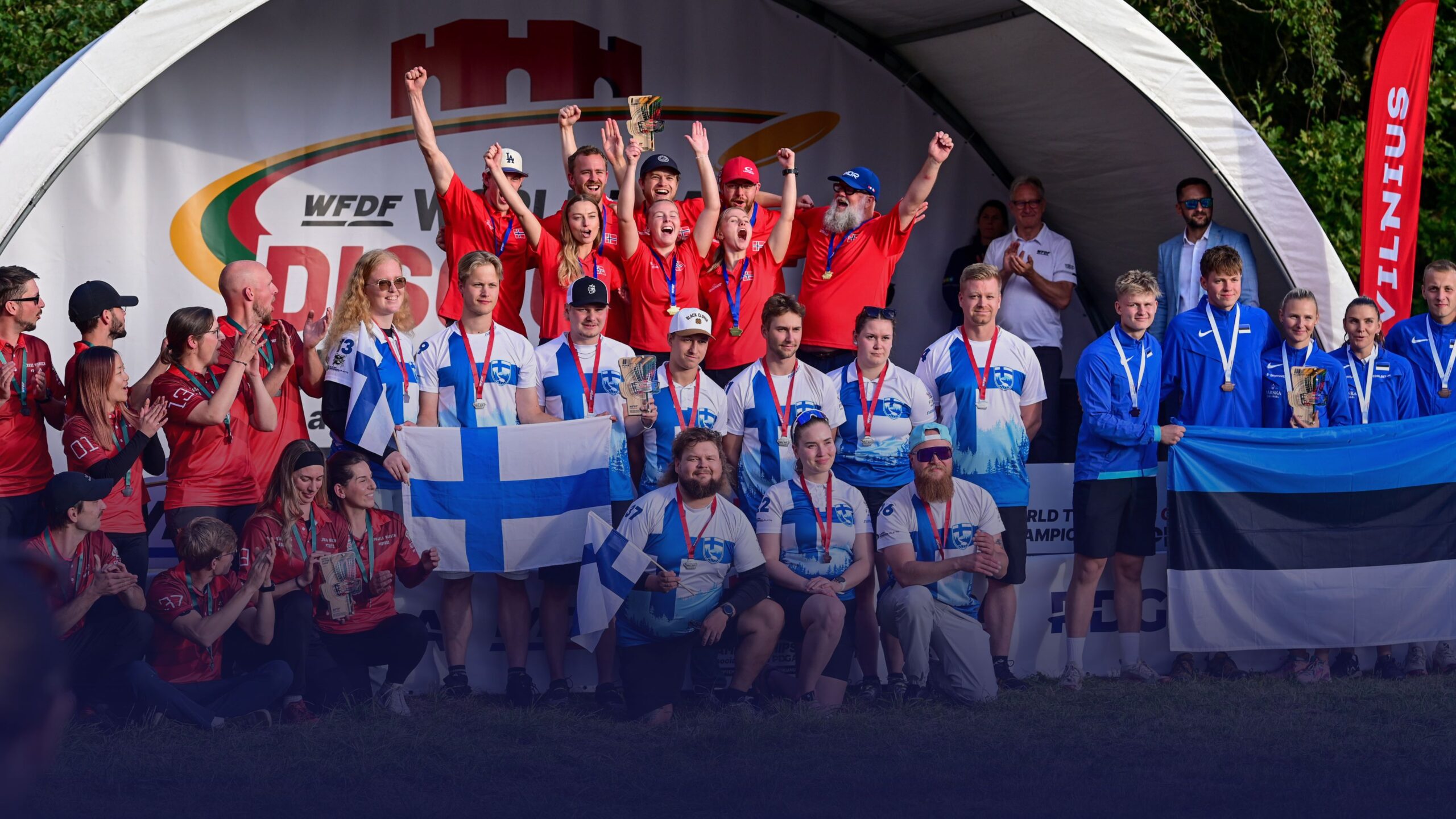 WFDF World Team Disc Golf Championships 2026 champions celebrate on stage in Vilnius